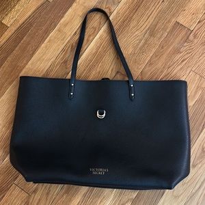 Victoria’s Secret black tote with red inside. Pleather. Strap closure